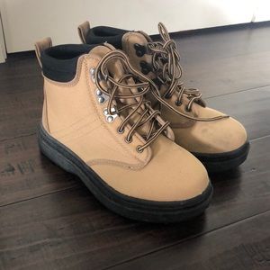 Frogg Toggs Mens wading boots with cleated bottom.
